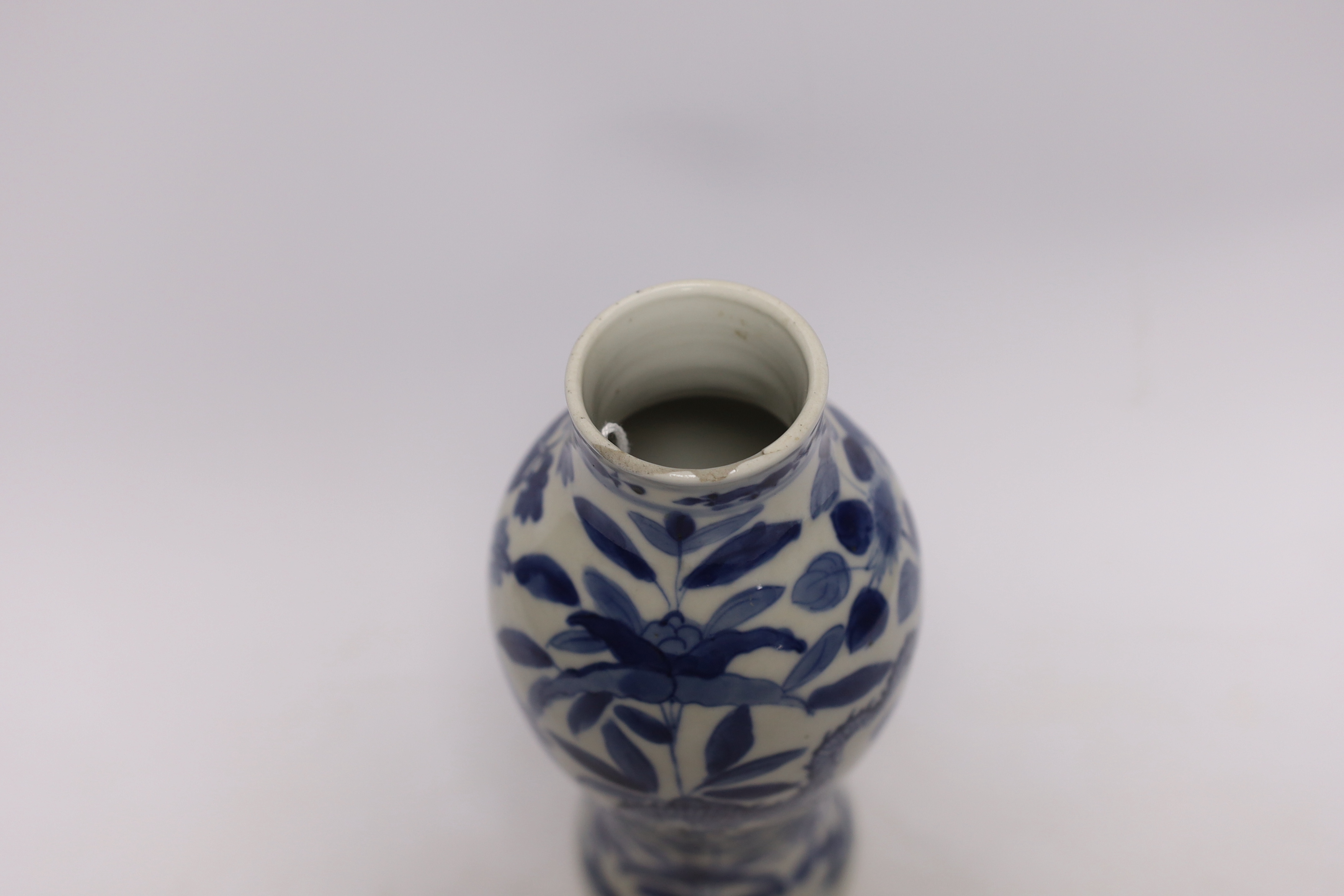 A Chinese blue and white dragon vase, Kangxi mark, late 19th century, 20.5cm high